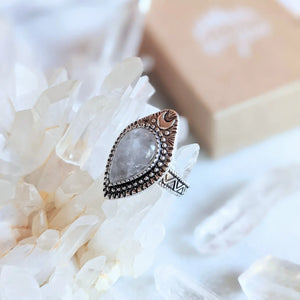 Clear Quartz Moonlight Ring on crystals