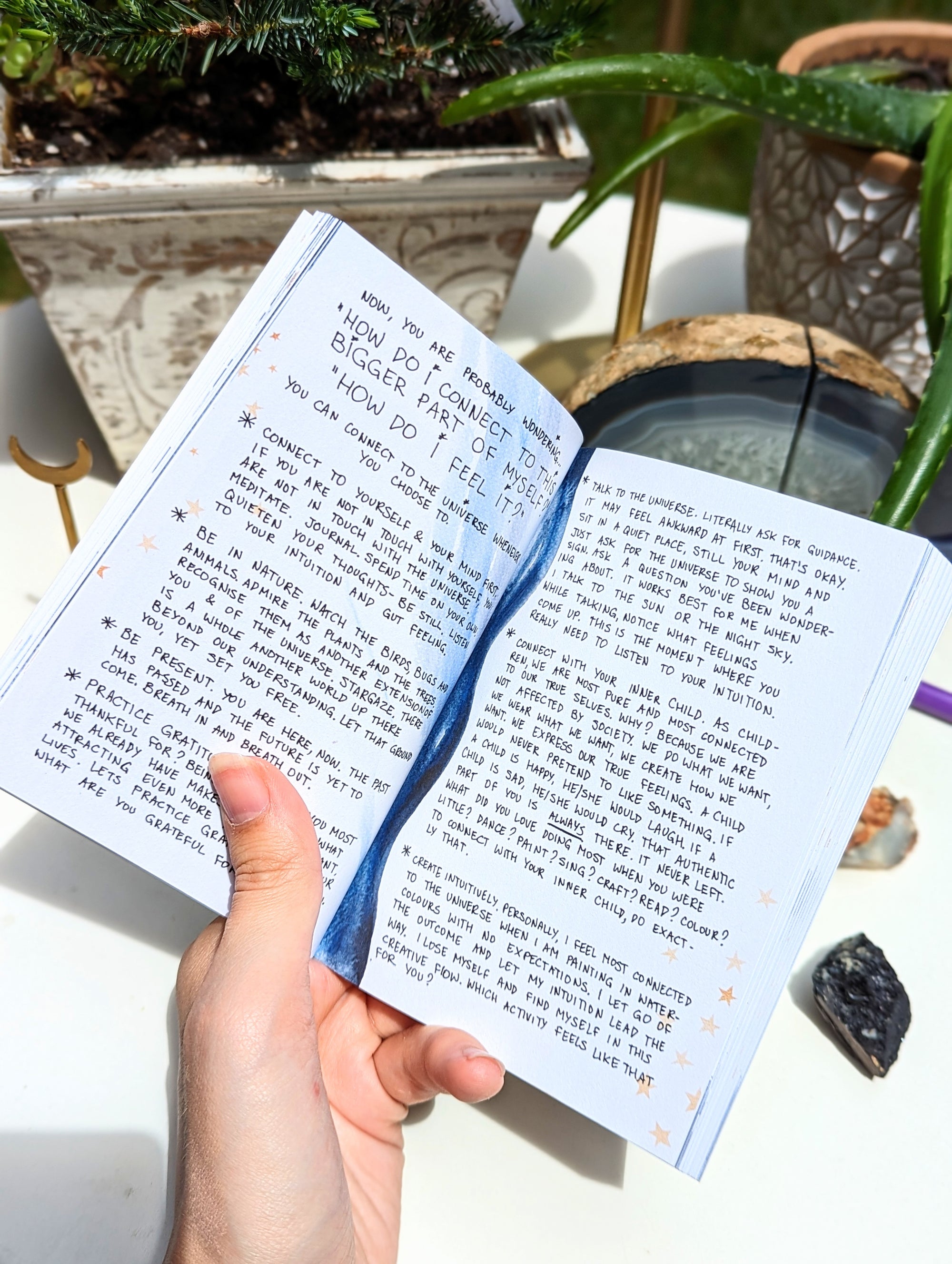 Dreamy moons manifest workbook featuring journal prompts and vision boards. Available at Goddess Provisions