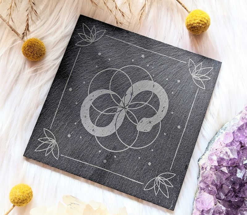 Infinite Magic Altar Tile on with a cloth background. Available at Goddess Provisions