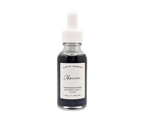 Obscura Ampoule Earth Harbour White background black seaweed available at Goddess Provisions.