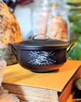 Mystic Cauldron for rituals and spellwork with mystical designs. Perfect for burning herbs, holding crystals, or enhancing your altar. Available at Goddess Provisions