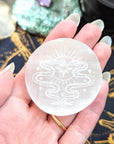 Engraved Selenite Palm Stone available at Goddess Provisions