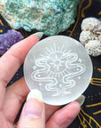 Engraved Selenite Palm Stone available at Goddess Provisions