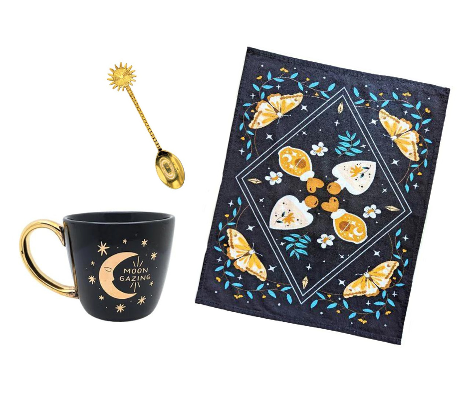 Celestial Tea Set including mug, tea towel, and golden spoon. Available at Goddess Provisions.